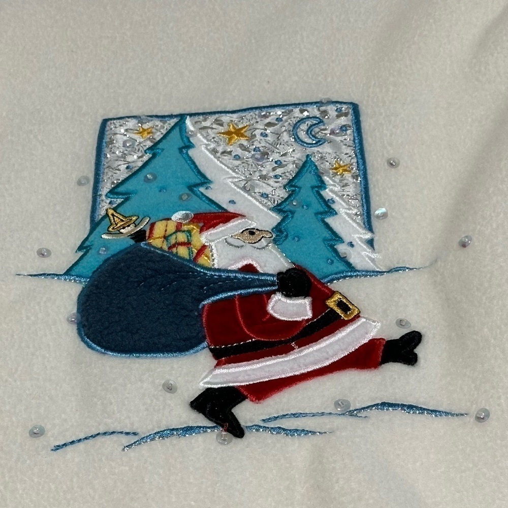 Beautiful fleece pullover with sequined Santa 3D design. Barely worn.